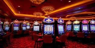 Tampilan permainan slot Ganesha Gold di platform jav togel dengan gulungan berwarna emas dan simbol mitologi Hindu